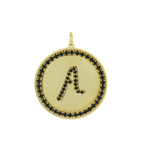 medallón inicial strass negro